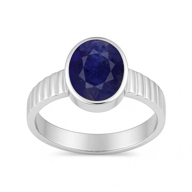 Silver ring with a blue gemstone on a white background